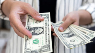 Dollar Edges Up but Still Set for Weekly Decline