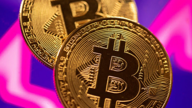Bitcoin Soars to Record High, then Tumbles