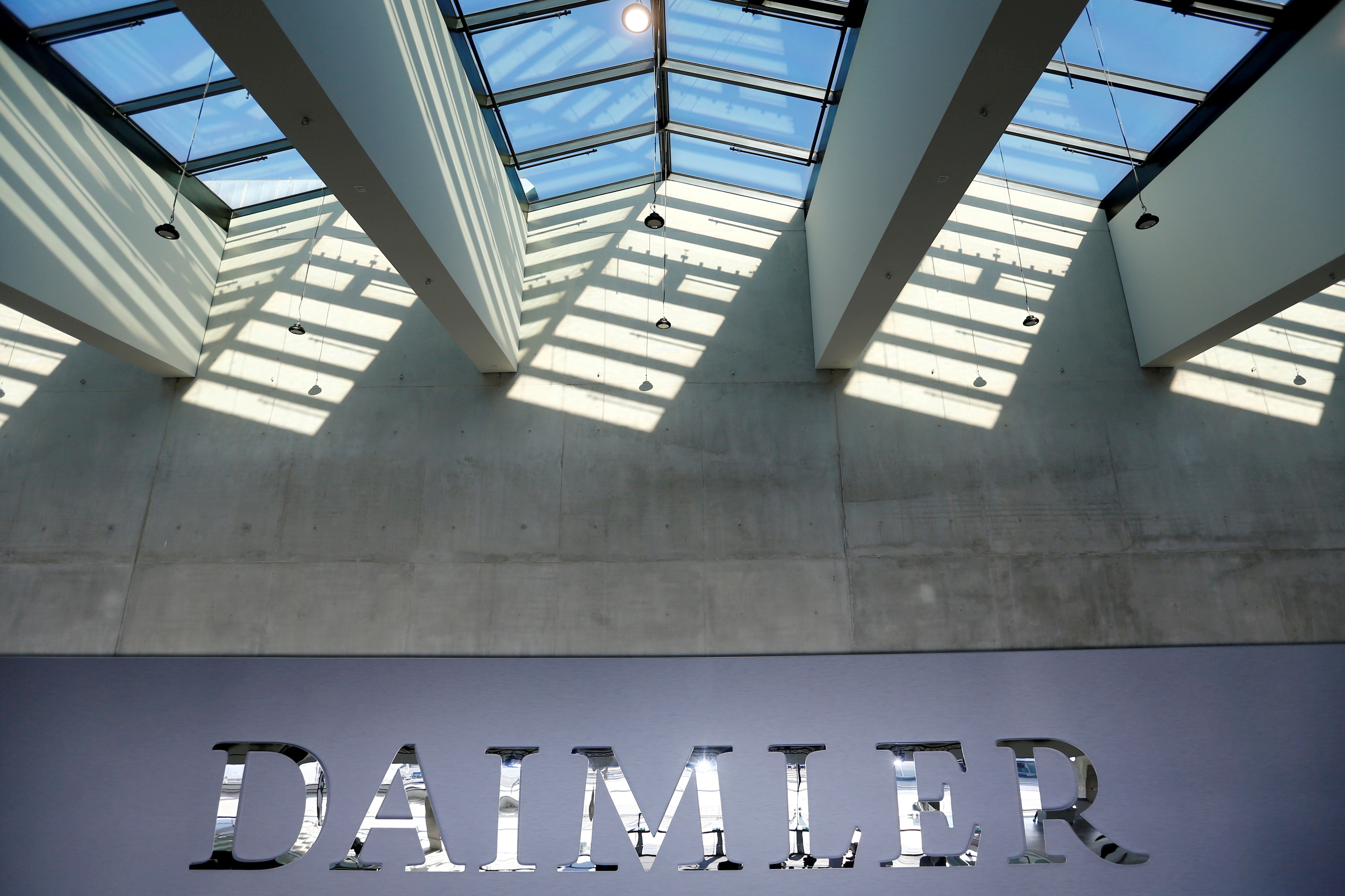 The Daimler logo is seen before the carmaker's annual shareholder meeting in Berlin, Germany, April 5, 2018. REUTERS/Hannibal Hanschke/File Photo