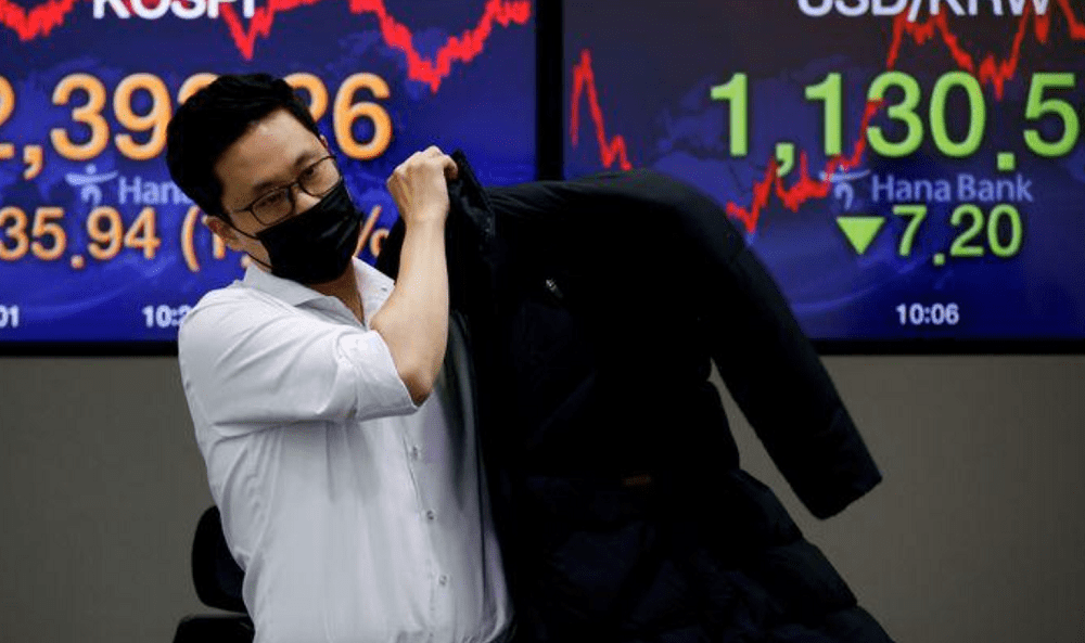 Asian equities, commodities gain on economic recovery trade