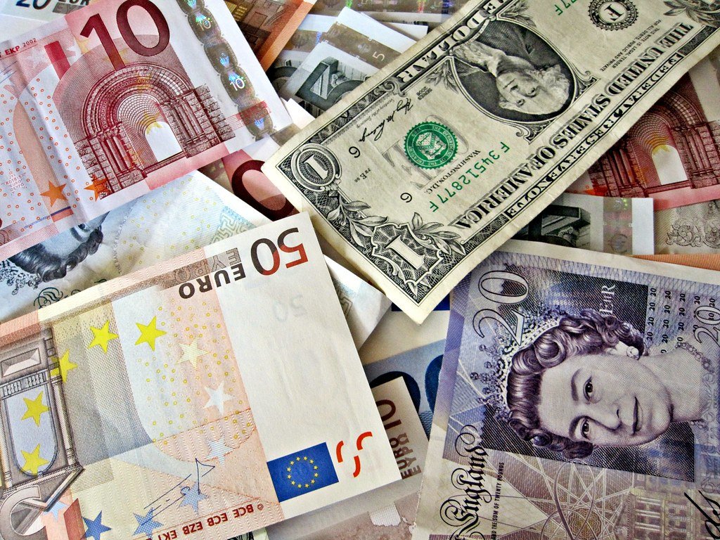 dollar slips to pound and euro