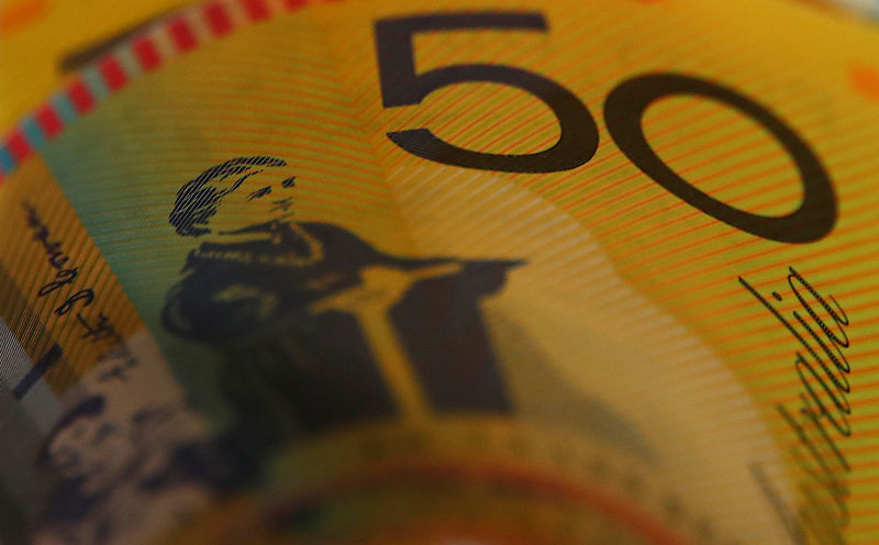Australian dollars are seen in an illustration photo February 8, 2018. REUTERS/Daniel Munoz