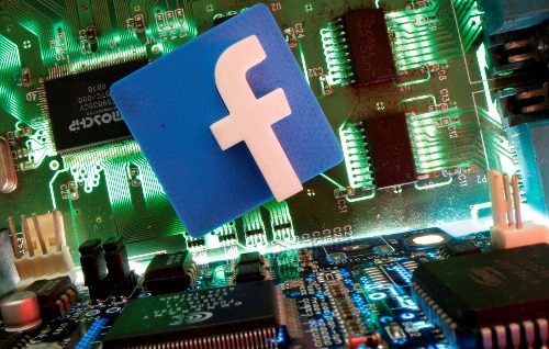 FILE PHOTO: Facebook symbol is seen on a motherboard in this picture illustration taken April 24, 2020. REUTERS/Dado Ruvic /Illustration
