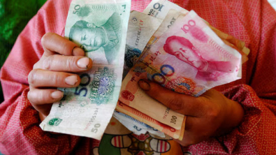 China Reins In Yuan as Weak Domestic Demand Clouds Outlook