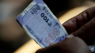 Rupee Ends Month and Quarter Tad Lower, Trails most Asian Peers
