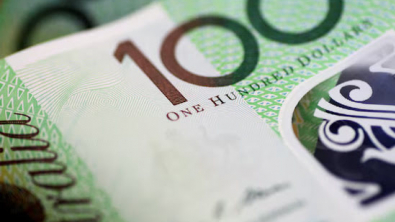 AUD Slips as RBA Cuts Rates, Warns on Global Outlook