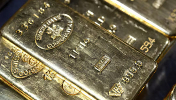 Gold Edges Up as Dollar Slips, Oil Falls before Data
