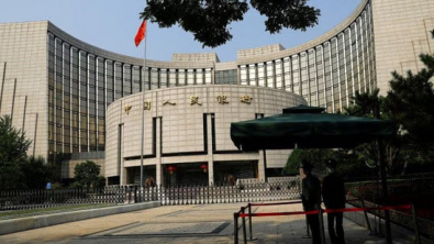 China Surprises with Modest Rate Cut amid Growing Yuan Risks