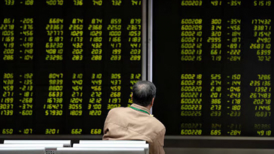 Stocks Churn as Traders Assess Fed Outlook Following Rate Cut