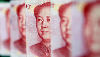 Yuan Bounces Off 1-mth Low on Firmer Guidance, Beijing Reveals 2026 Targets