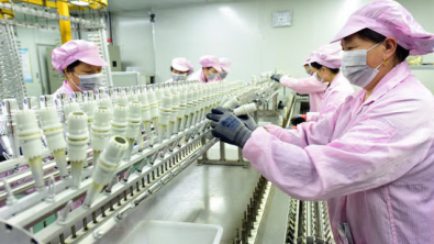 China's Economy Jolted by Weakest Factory Output, Retail Sales Growth in over Year