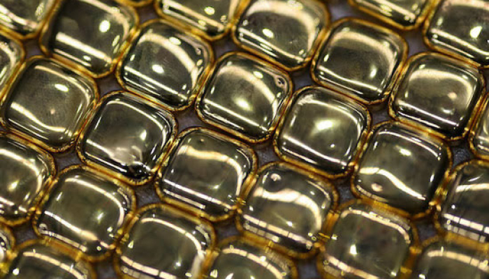 Gold Eases on Higher Oil Prices ahead of Fed Decision