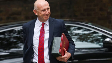 UK Finance Chief Calms Market, but Tax and Debt Risks Loom