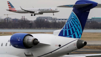 United Airlines CEO Pitched American Airlines Tie-Up in Meeting with Trump, Sources