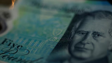 Sterling Dips after Data Points to Cooling UK Labour Market