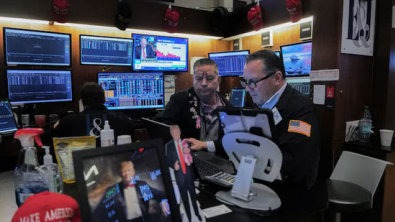 Wall St Closes Lower as Investors Position for Busy Week of Data