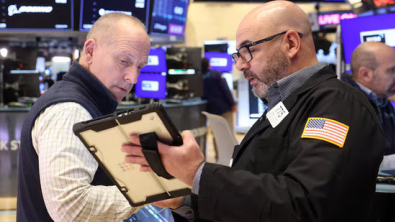 Wall Street Ends Mixed as Tech Dips, Defense Stocks Rally