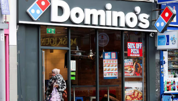 Domino's Keeps Sales View, Value-Seeking Diners Slow Growth