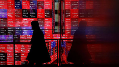 Japan's Nikkei Ends at Record, Automakers Rise on Weaker Yen