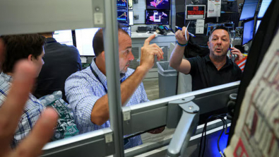Wall Street Ends Lower as Chip Weakness Blunts Good Data