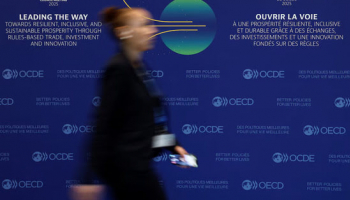 OECD Lowers Global Outlook as Trump Trade wWr Hits US Growth