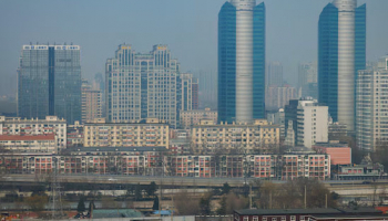 China Poised to Trim Growth Ambitions, Pursue Timid Rebalancing Efforts