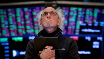 Wall St Ends Lower as Iran Tensions Dent Risk, Chips Drop