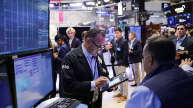 Wall St Ends Higher as Investors Digest Trump Trade Comments