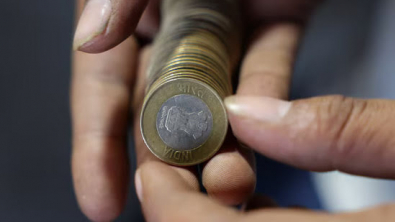 Oil Woes, Capital Outflows Drag Rupee to Record Low