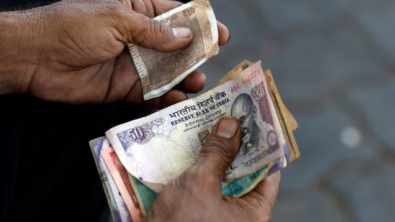 Rupee Drifts as RBI Keeps Tight Leash; Premiums Slip