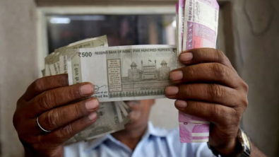 INR Ends Flat, NDF Maturity-Linked USD Bids Blunt Modest Inflows