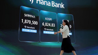 Asian Shares Fall on Chip Drag; Bonds Cheer Cool Inflation