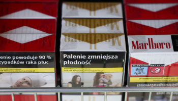 Philip Morris Cuts Outlook as Currency Volatility Bites