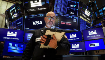 Dow Hits Record High after Soft Jobs Data; Nasdaq Dips
