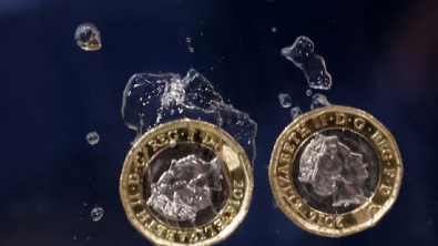 GBP Edges Lower, BoE's Bailey Signals no Rush to Raise Rates