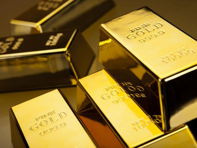 Gold soars as Fed sounds warnings on asset prices, US recovery